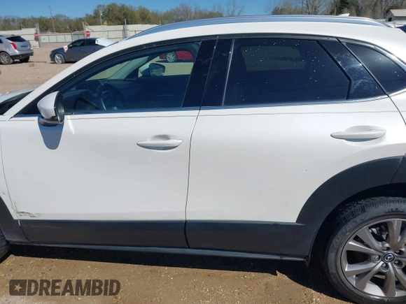 2022 Mazda CX-30 S Premium with VIN 3MVDMBDL1NM413540, listed as a IAAI auction lot 41681191 with 57,764 mi miles and . Bid and sale history available at carsss.com. Image 15.