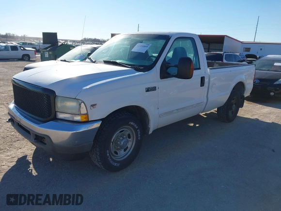 2002 Ford Super Duty F-250 XL with VIN 1FTNF20L12EB69721, listed as a IAAI auction lot 41324860 with 232,751 mi miles. Bid and sale history available at carsss.com. Image 2.