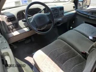 2000 Ford F-250 XL with VIN 1FTNX20L1YEB50589, listed as a Copart auction lot 63743775 with 105,448 mi miles and Salvage title. Bid and sale history available at DreamBid. Image 8.