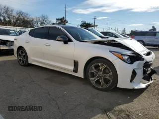 2021 Kia Stinger GT-Line with VIN KNAE15LA3M6098185, listed as a Copart auction lot 77583563 with 70,852 mi miles and Salvage Title. Bid and sale history available at carsss.com. Image 4.