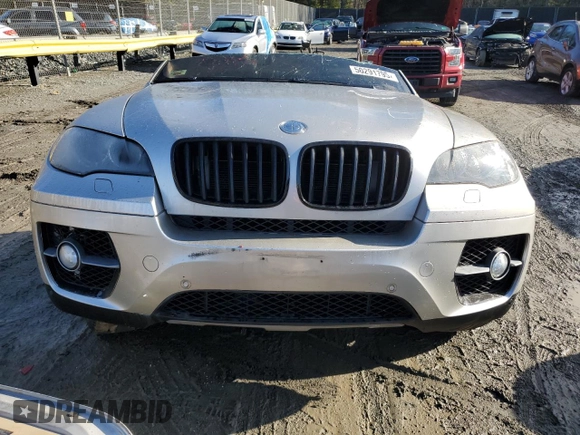 2011 BMW X6 50i with VIN 5UXFG8C58BLZ96045, listed as a Copart auction lot 50291795 with 0 mi miles and Salvage Title. Bid and sale history available at carsss.com. Image 5.