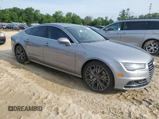 2016 Audi A7 Prestige with VIN WAU2GAFC9GN018146, listed as a Copart auction lot 60265005 with 115,330 mi miles and Salvage title. Bid and sale history available at DreamBid. Image 4.