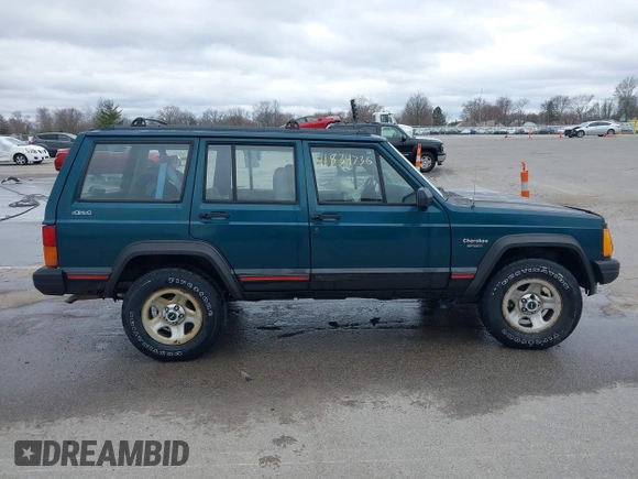 1996 Jeep Cherokee Sport with VIN 1J4FJ68S5TL235507, listed as a IAAI auction lot 41834736 with 174,634 mi miles. Bid and sale history available at carsss.com. Image 13.