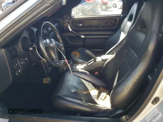 2003 Toyota MR2 z VIN JTDFR320630056446, wystawiony jako Copart lot #49596745 z przebiegiem 126 066 mil mil oraz Szkoda całkowita • Salvage title. Historia ofert i sprzedaży dostępna na DreamBid. Obrazek 7.