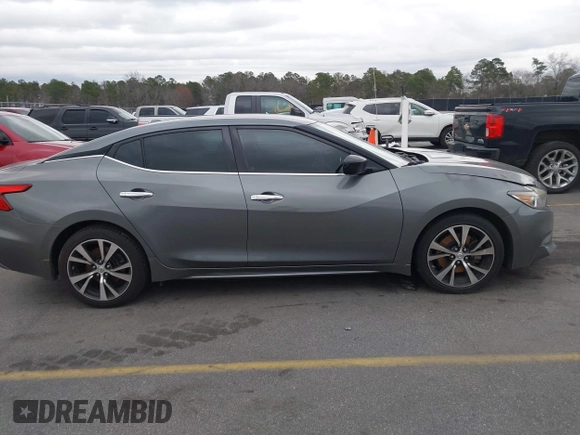 2018 Nissan Maxima SV with VIN 1N4AA6APXJC400203, listed as a IAAI auction lot 41617771 with 107,366 mi miles and . Bid and sale history available at DreamBid. Image 13.