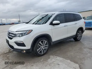 2017 Honda Pilot Elite with VIN 5FNYF6H03HB063437, listed as a Copart auction lot 86390054 with 119,352 mi miles and Salvage Title. Bid and sale history available at DreamBid. Image 1.