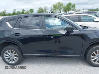 2024 Mazda CX-5 S Select with VIN JM3KFBBL1R0503003, listed as a IAAI auction lot 42149860 with 23,133 mi miles and . Bid and sale history available at DreamBid. Image 14.