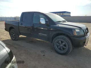 2015 Nissan Titan Pro-4X with VIN 1N6BA0EC9FN507495, listed as a Copart auction lot 49336715 with 95,749 mi miles and Clean title. Bid and sale history available at DreamBid. Image 4.