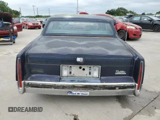 1990 Cadillac DeVille z VIN 1G6CD5337L4238206, wystawiony jako Copart lot #58214584 z przebiegiem Nie podano mil oraz Szkoda całkowita • Salvage title. Historia ofert i sprzedaży dostępna na DreamBid. Obrazek 6.