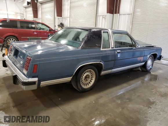 1987 Ford Crown Victoria z VIN 2FABP71F2HX156902, wystawiony jako Copart lot #74368944 z przebiegiem 77 708 mil mil oraz Szkoda całkowita • Salvage title. Historia ofert i sprzedaży dostępna na DreamBid. Obrazek 3.