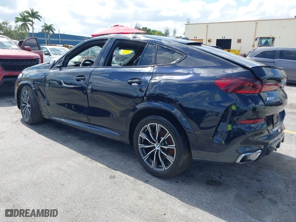 2024 BMW X6 xDrive40i with VIN 5UX33EX07R9V74903, listed as a IAAI auction lot 42063171 with 22,384 mi miles. Bid and sale history available at carsss.com. Image 3.