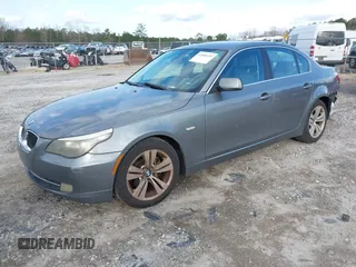 2010 BMW 5 Series 528i with VIN WBANU5C5XAC124594, listed as a IAAI auction lot 41848155 with 182,845 mi miles and . Bid and sale history available at carsss.com. Image 2.