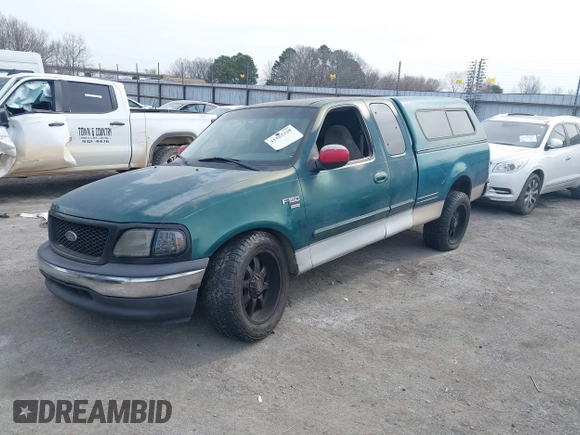 2000 Ford F-150 XL with VIN 2FTRX17W1YCA76589, listed as a IAAI auction lot 41452320 with 254,533 mi miles. Bid and sale history available at carsss.com. Image 2.