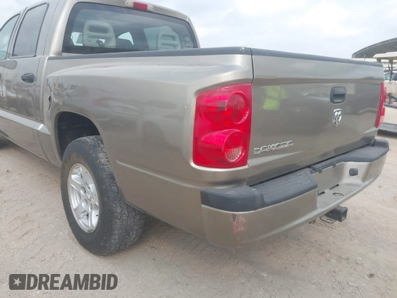 2006 Dodge Dakota SLT with VIN 1D7HE48N16S703072, listed as a IAAI auction lot 42156709 with 102,919 mi miles. Bid and sale history available at carsss.com. Image 6.