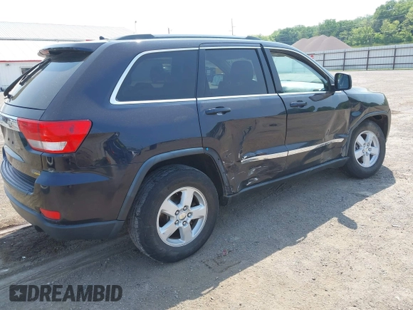 2011 Jeep Grand Cherokee Laredo with VIN 1J4RR4GG2BC550934, listed as a IAAI auction lot 42467947 with 198,904 mi miles and . Bid and sale history available at DreamBid. Image 4.