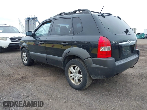 2007 Hyundai Tucson SE with VIN KM8JN12D77U667867, listed as a IAAI auction lot 42082092 with 240,911 mi miles. Bid and sale history available at carsss.com. Image 3.