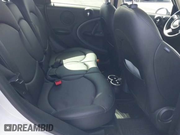 2016 MINI Countryman S with VIN WMWZC3C51GWT10458, listed as a IAAI auction lot 41878799 with 112,019 mi miles and . Bid and sale history available at DreamBid. Image 8.