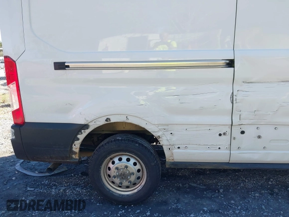 2023 Ford Transit Cargo with VIN 1FTBR2C8XPKA33372, listed as a IAAI auction lot 41735299 with 56,777 mi miles and . Bid and sale history available at DreamBid. Image 18.