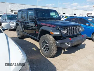 2024 Jeep Wrangler Rubicon with VIN 1C4PJXFG2RW276330, listed as a IAAI auction lot 41866339 with 23,168 mi miles. Bid and sale history available at carsss.com. Image 1.
