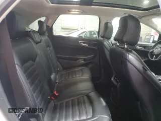 2023 Ford Edge SEL z VIN 2FMPK4J94PBA22570, wystawiony jako Copart lot #56350435 z przebiegiem 27 761 mil mil oraz Szkoda całkowita • Salvage title. Historia ofert i sprzedaży dostępna na DreamBid. Obrazek 11.