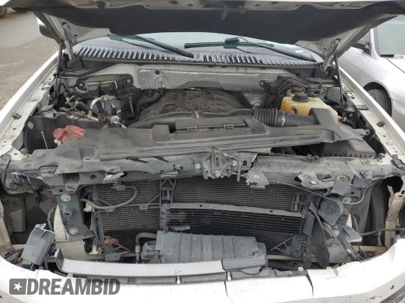 2015 Ford Expedition Limited with VIN 1FMJU2AT4FEF42061, listed as a Copart auction lot 45401745 with 216,724 mi miles and Salvage title. Bid and sale history available at DreamBid. Image 11.