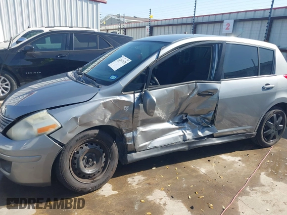 2009 Nissan Versa 1.8 SL with VIN 3N1BC13E19L372298, listed as a IAAI auction lot 42011338 with 131,882 mi miles. Bid and sale history available at carsss.com. Image 6.