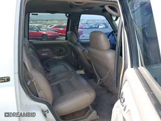 1997 Chevrolet Tahoe with VIN 1GNEK13R6VJ443195, listed as a IAAI auction lot 42000733 with 202,106 mi miles. Bid and sale history available at carsss.com. Image 8.