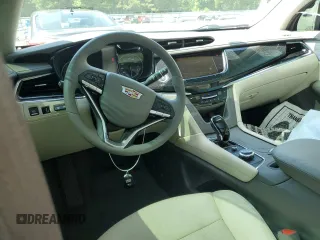 2022 Cadillac XT6 Premium Luxury with VIN 1GYKPCRS7NZ101706, listed as a Copart auction lot 63389985 with 27,021 mi miles and Salvage title. Bid and sale history available at DreamBid. Image 8.