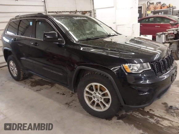 2018 Jeep Grand Cherokee Laredo E with VIN 1C4RJFAG0JC154937, listed as a IAAI auction lot 41966764 with 85,415 mi miles and . Bid and sale history available at DreamBid. Image 1.