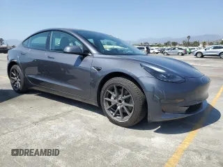2023 Tesla Model 3 with VIN 5YJ3E1EA3PF695267, listed as a Copart auction lot 52559645 with 9,025 mi miles and Salvage title. Bid and sale history available at DreamBid. Image 4.