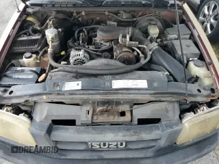 1998 Isuzu Hombre z VIN 1GGCS19X0W8650520, wystawiony jako Copart lot #73962444 z przebiegiem Nie podano mil oraz Szkody całkowita. Historia ofert i sprzedaży dostępna na DreamBid. Obrazek 11.