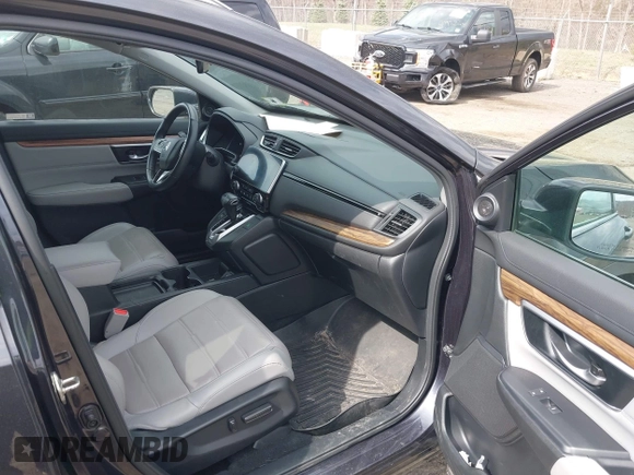 2019 Honda CR-V Touring with VIN 2HKRW2H9XKH636354, listed as a IAAI auction lot 41902615 with 66,781 mi miles and . Bid and sale history available at DreamBid. Image 5.