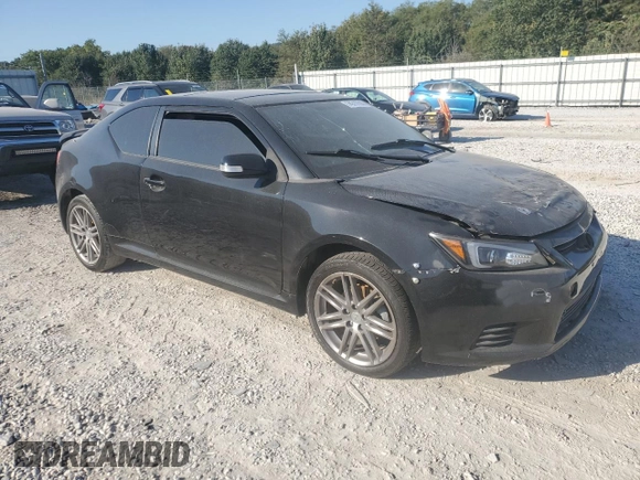2012 Scion tC z VIN JTKJF5C73C3034583, wystawiony jako Copart lot #74317714 z przebiegiem 163 158 mil mil oraz Czysty tytuł • Clean title. Historia ofert i sprzedaży dostępna na DreamBid. Obrazek 4.