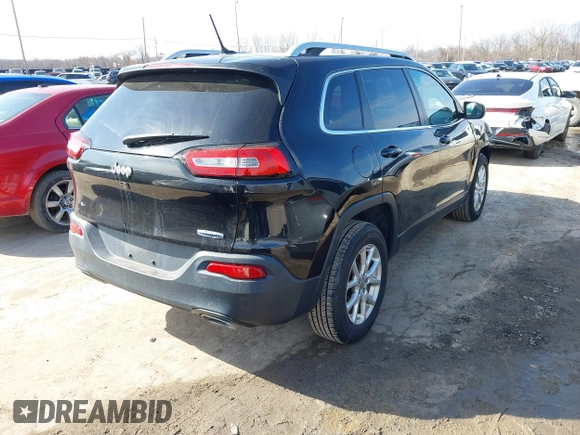2015 Jeep Cherokee North with VIN 1C4PJMCS4FW792918, listed as a IAAI auction lot 41748651 with 107,034 mi miles. Bid and sale history available at carsss.com. Image 4.