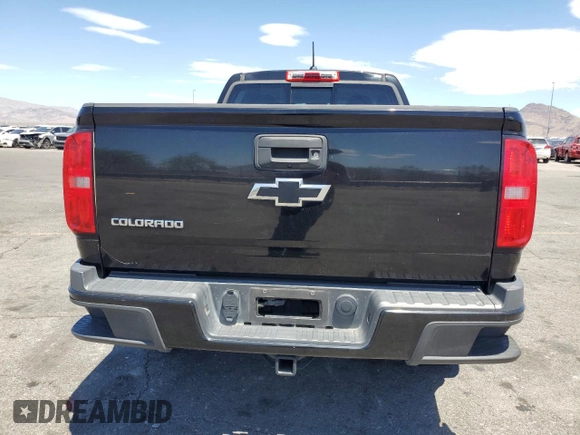 2015 Chevrolet Colorado 2WD Z71 with VIN 1GCGSCE32F1250923, listed as a Copart auction lot 64321225 with 196,595 mi miles and Salvage title. Bid and sale history available at DreamBid. Image 6.