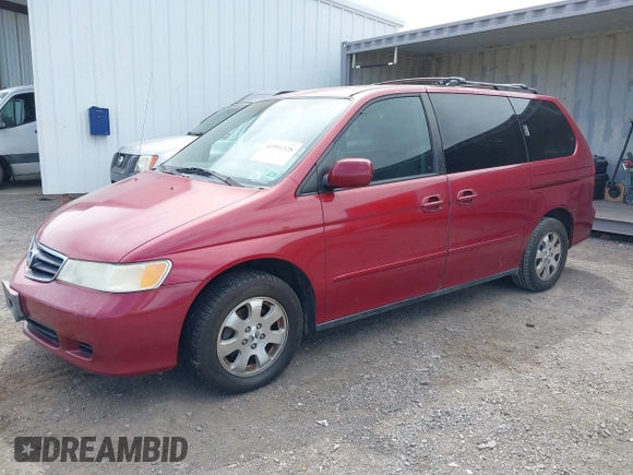 2003 Honda Odyssey EX with VIN 5FNRL18643B086576, listed as a IAAI auction lot 41991328 with 130,025 mi miles and . Bid and sale history available at carsss.com. Image 2.