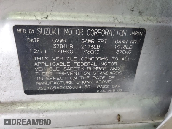 2012 Suzuki SX4 LE z VIN JS2YC5A34C6304150, wystawiony jako Copart lot #48629255 z przebiegiem 104 658 mil mil oraz Szkoda całkowita • Salvage title. Historia ofert i sprzedaży dostępna na DreamBid. Obrazek 14.