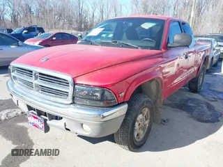 1999 Dodge Dakota SLT with VIN 1B7GG22Y3XS289253, listed as a IAAI auction lot 41283728 with 154,038 mi miles and . Bid and sale history available at carsss.com. Image 2.