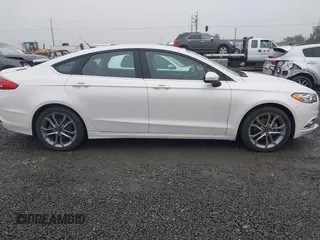2017 Ford Fusion SE z VIN 3FA6P0H71HR201799, wystawiony jako IAAI lot #41346018 z przebiegiem 51 126 mil mil oraz . Historia ofert i sprzedaży dostępna na DreamBid. Obrazek 13.