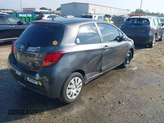 2015 Toyota Yaris L with VIN VNKJTUD35FA054329, listed as a IAAI auction lot 42289132 with 122,257 mi miles and . Bid and sale history available at DreamBid. Image 4.