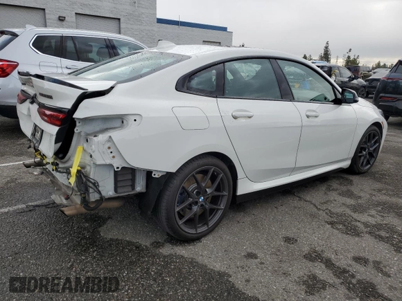 2020 BMW 2 Series M235i xDrive with VIN WBA13AL07L7G06064, listed as a Copart auction lot 42617345 with 67,338 mi miles and Salvage Title. Bid and sale history available at carsss.com. Image 3.