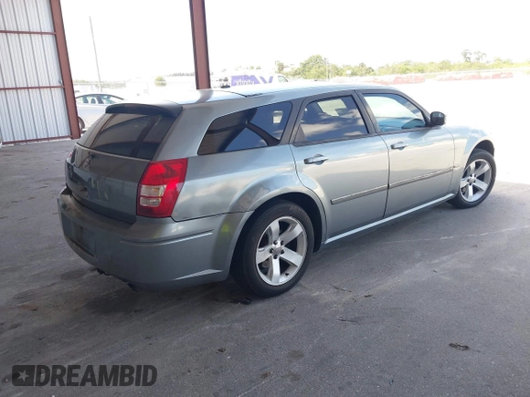 2007 Dodge Magnum with VIN 2D4FV47V87H776356, listed as a IAAI auction lot 41965436 with 285,585 mi miles and . Bid and sale history available at carsss.com. Image 4.