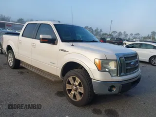 2011 Ford F-150 XLT with VIN 1FTFW1CT9BFB17418, listed as a IAAI auction lot 41485170 with 165,055 mi miles. Bid and sale history available at carsss.com. Image 1.