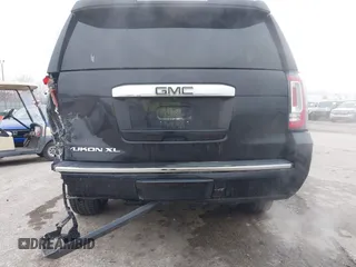 2017 GMC Yukon XL Denali with VIN 1GKS2HKJ2HR310377, listed as a IAAI auction lot 41153582 with 130,194 mi miles. Bid and sale history available at carsss.com. Image 17.