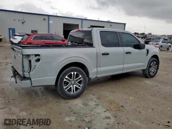 2023 Ford F-150 XL with VIN 1FTEW1CP8PKD11810, listed as a Copart auction lot 60453315 with 83,312 mi miles and Salvage title. Bid and sale history available at DreamBid. Image 3.