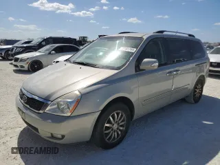 2012 Kia Sedona EX with VIN KNDMH4C72C6459882, listed as a Copart auction lot 77481744 with 136,947 mi miles and Salvage Title. Bid and sale history available at carsss.com. Image 1.