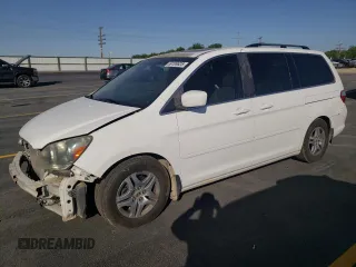 2006 Honda Odyssey EX-L with VIN 5FNRL38706B442417, listed as a Copart auction lot 59189825 with 210,208 mi miles and Salvage title. Bid and sale history available at DreamBid. Image 1.