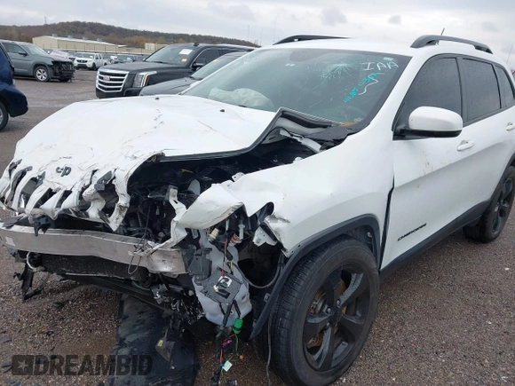 2016 Jeep Cherokee Latitude with VIN 1C4PJMCSXGW214243, listed as a IAAI auction lot 40850362 with 96,240 mi miles and . Bid and sale history available at carsss.com. Image 6.