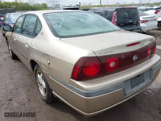 2004 Chevrolet Impala with VIN 2G1WF52E449148302, listed as a IAAI auction lot 42017347 with 233,618 mi miles. Bid and sale history available at carsss.com. Image 3.