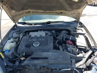 2005 Nissan Altima SE z VIN 1N4BL11D65C148642, wystawiony jako IAAI lot #42056330 z przebiegiem 81 328 mil mil oraz . Historia ofert i sprzedaży dostępna na DreamBid. Obrazek 10.